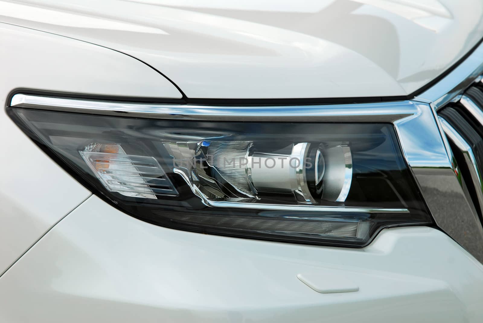 headlights on a modern passenger car by aselsa