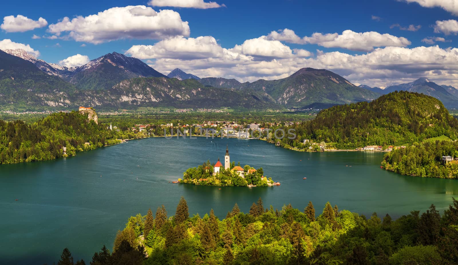 Lake Bled Slovenia. Beautiful mountain lake with small Pilgrimage Church. Most famous Slovenian lake and island Bled with Pilgrimage Church of the Assumption of Maria. Bled, Slovenia, Europe. 