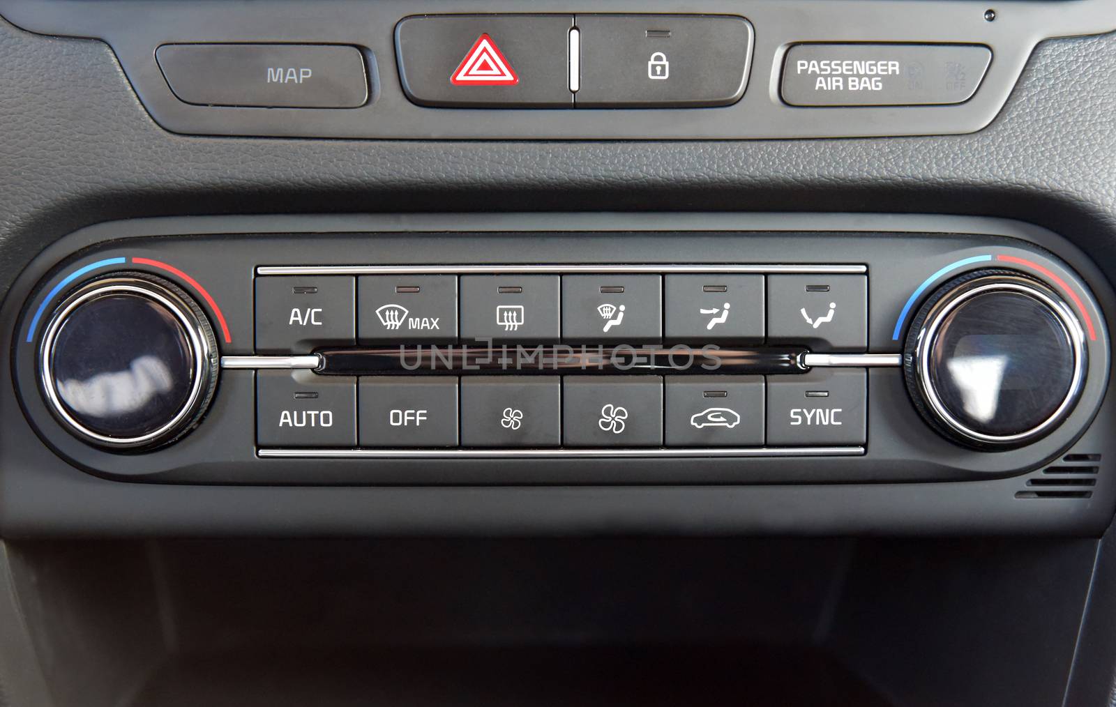 manual switches the air conditioning on the dashboard of the car