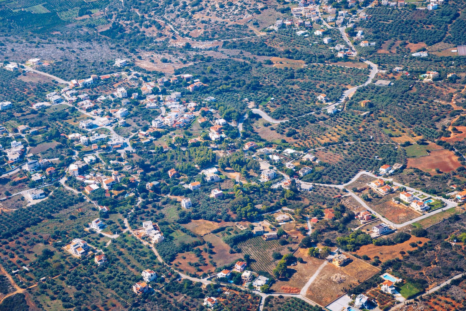 Crete island. Beautiful view of the Crete island Greece from the plane. Holiday, relaxation, sea. Crete view from plane. Greek Island. Seaside of Crete island, aerial view, Greece.