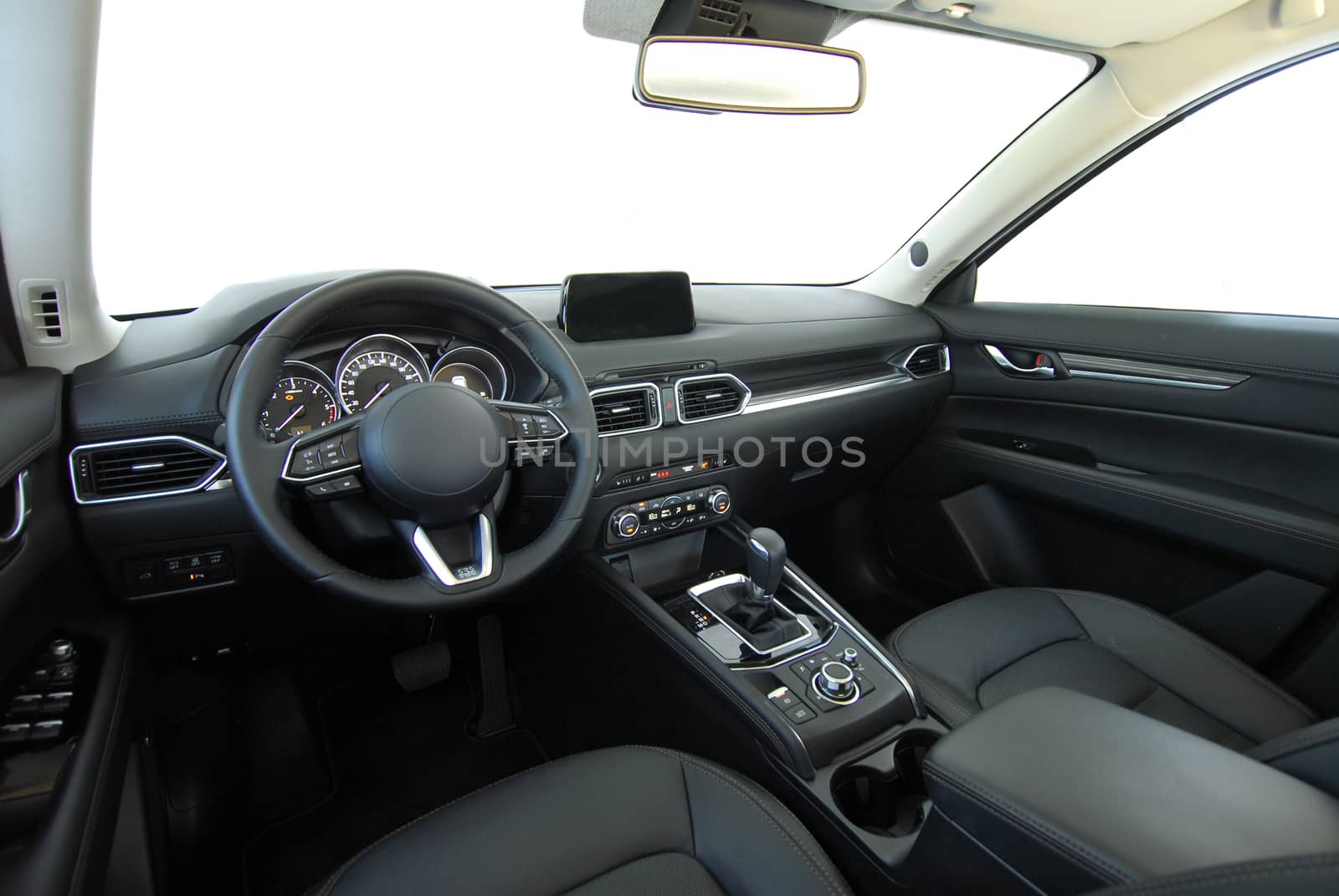 studio shot passenger car interior, front view