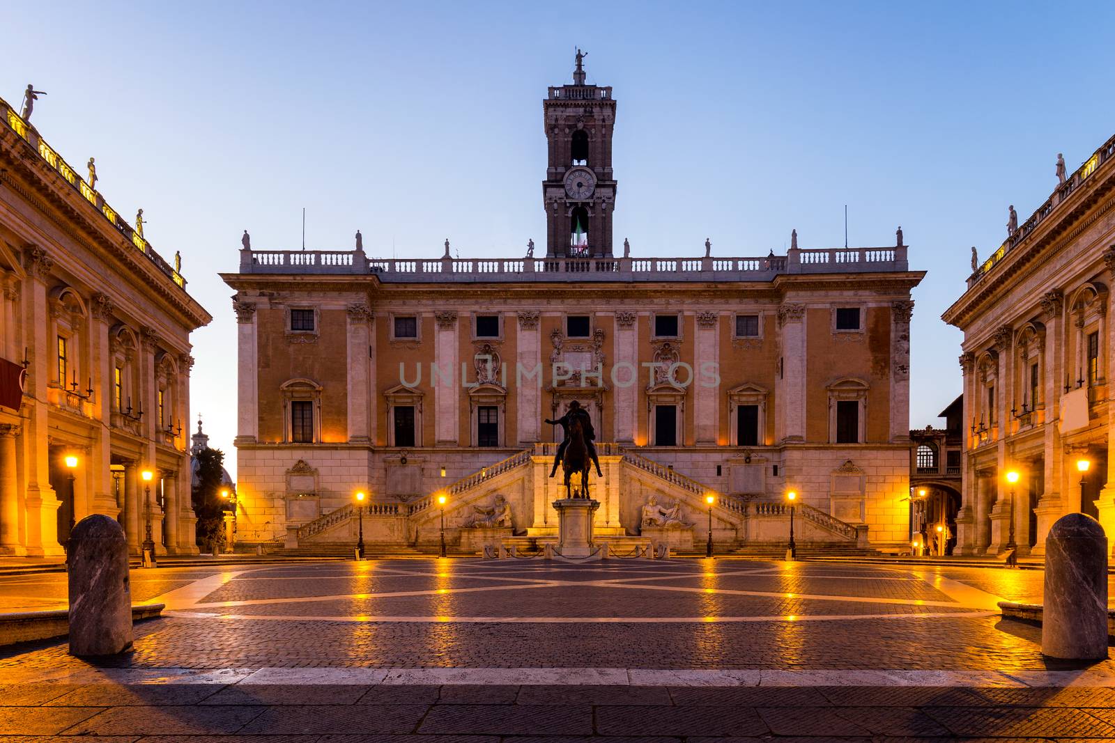 Italy Rome Capitoline hill city square museum buildings and statue illuminated at sunrise