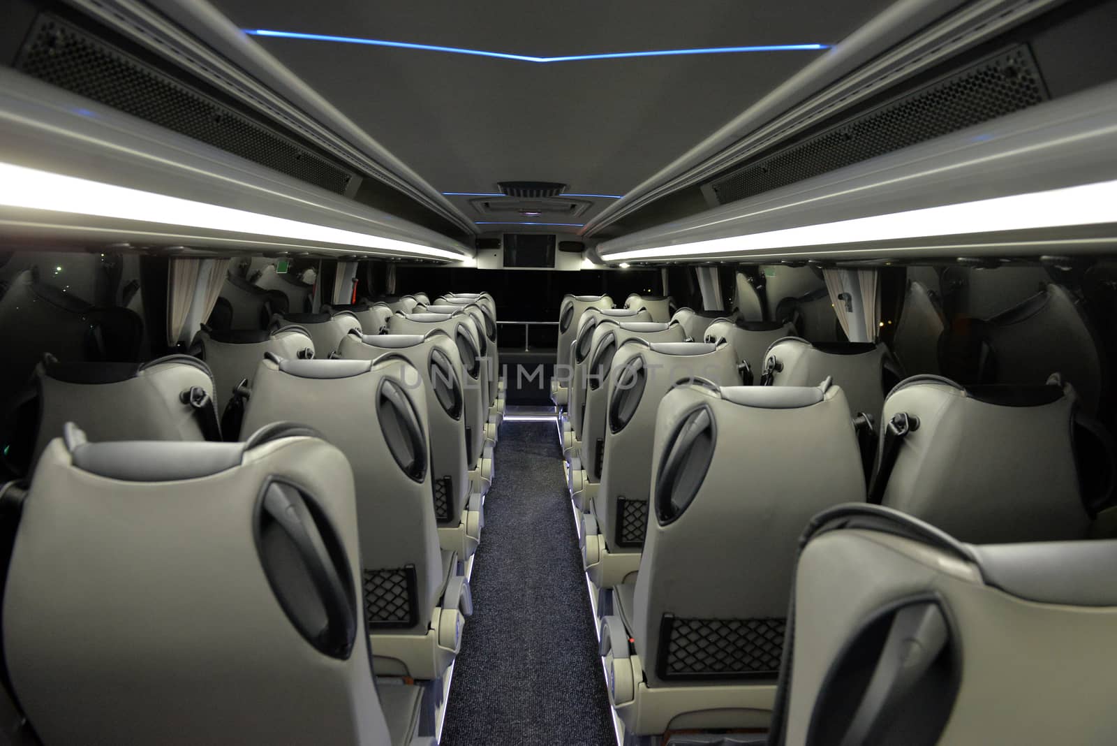 the interior of a high-class tourist bus, bus seats