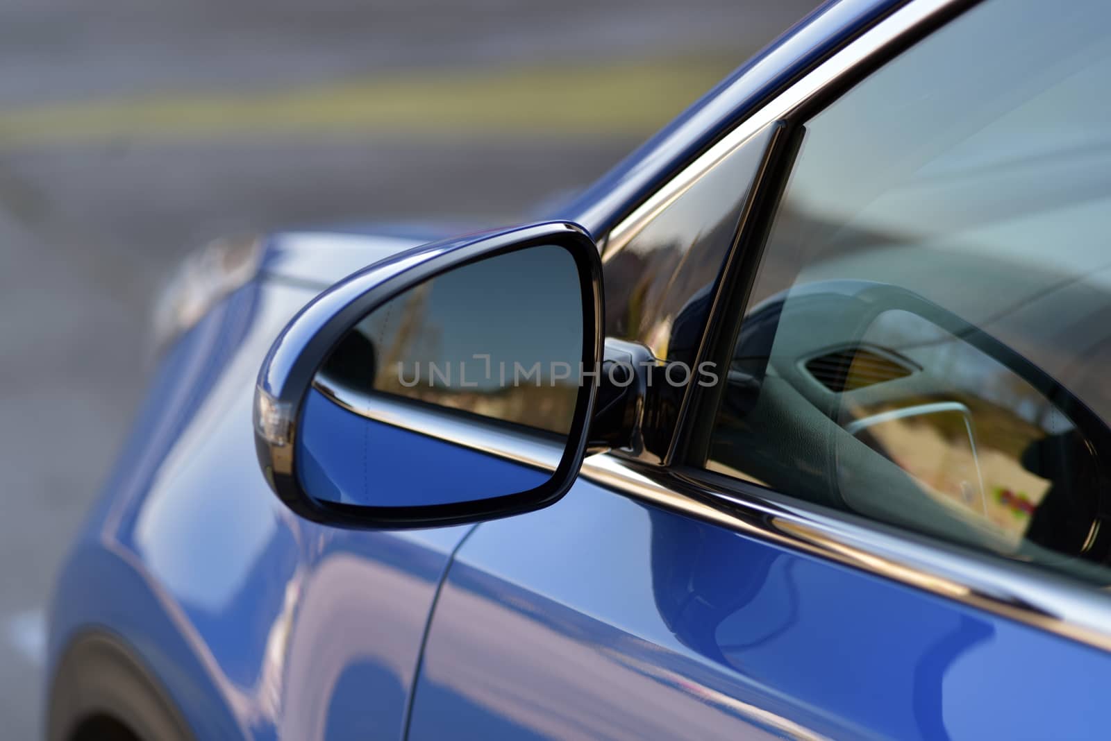 Car detail, Side mirror with turn signal of a luxury car