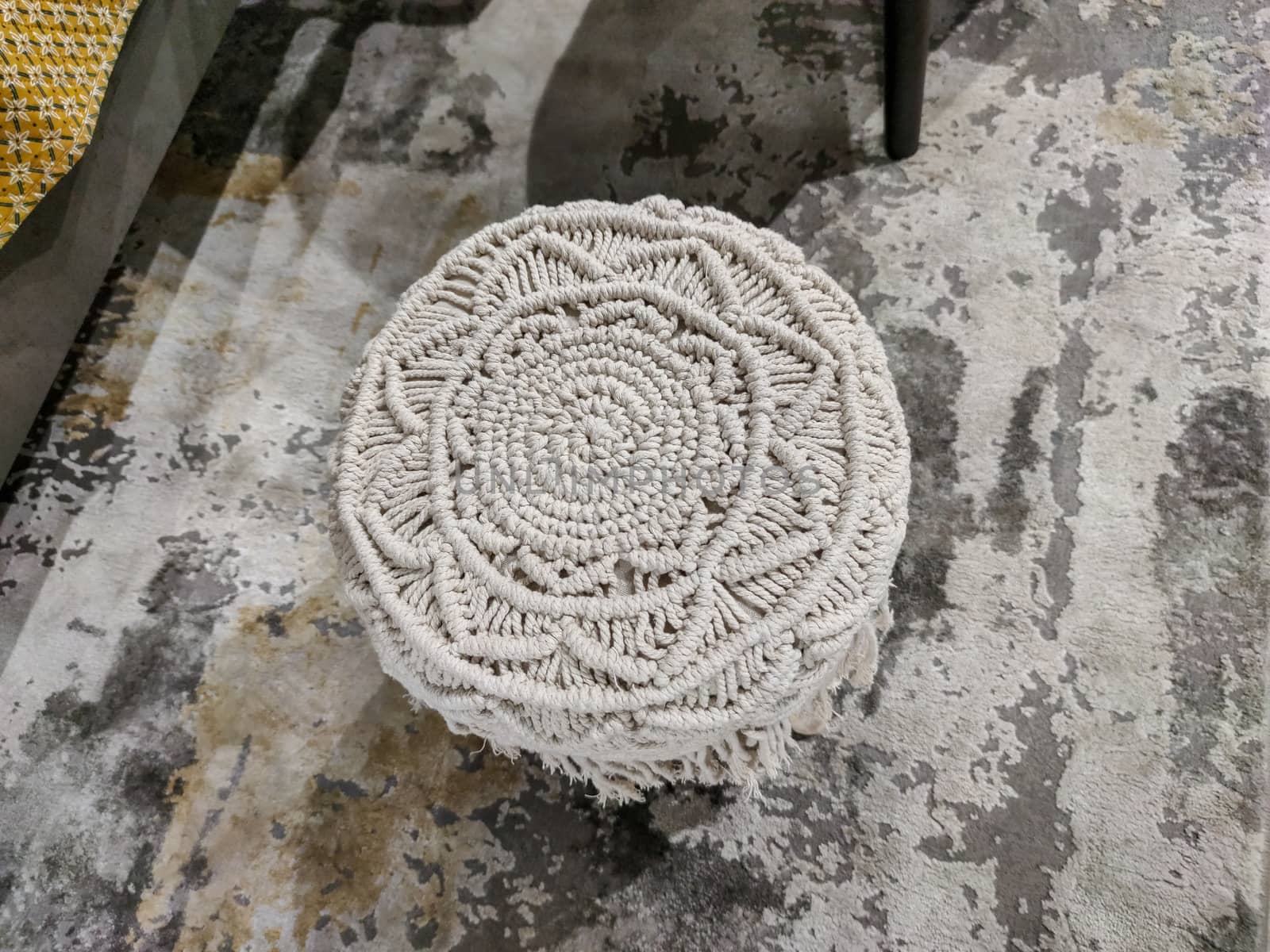 a white decoration on a carpet by devoxer