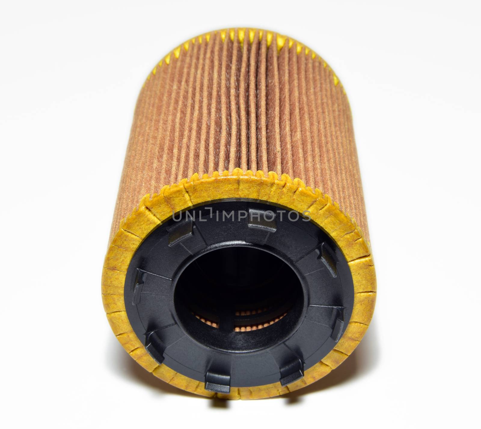 car oil filter cartridge on white background