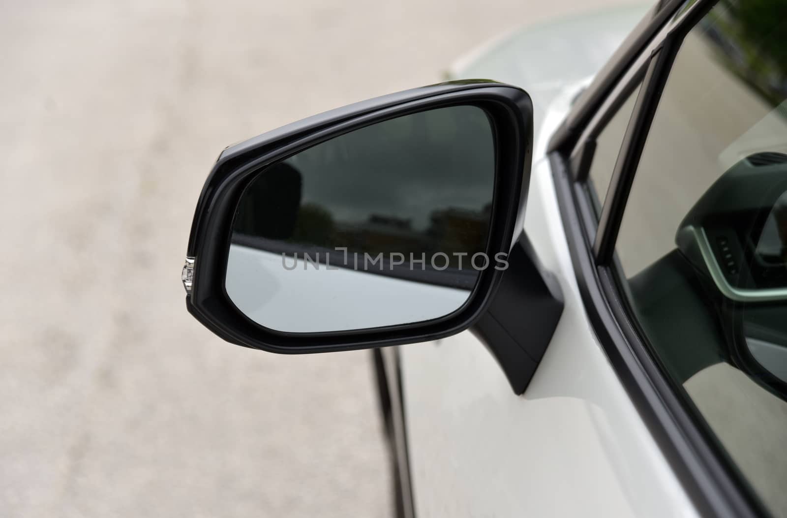 Car detail, Side mirror with turn signal of a luxury car