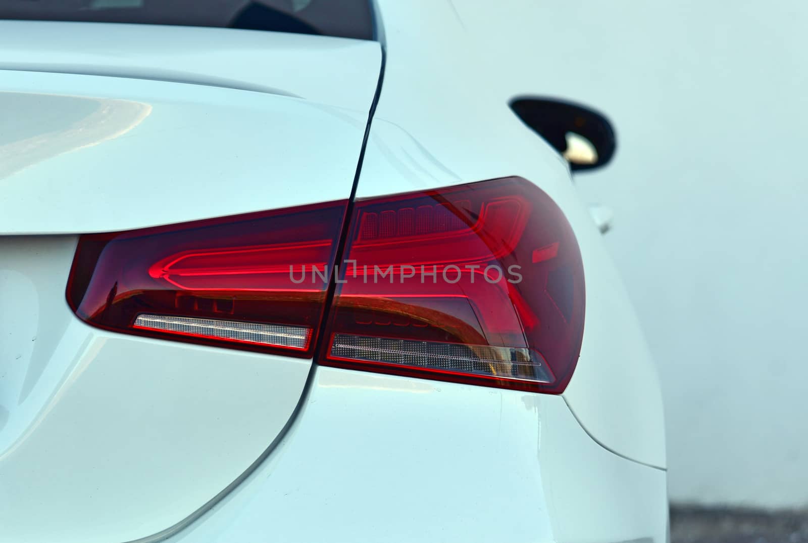 the tail lights on a luxury passenger car