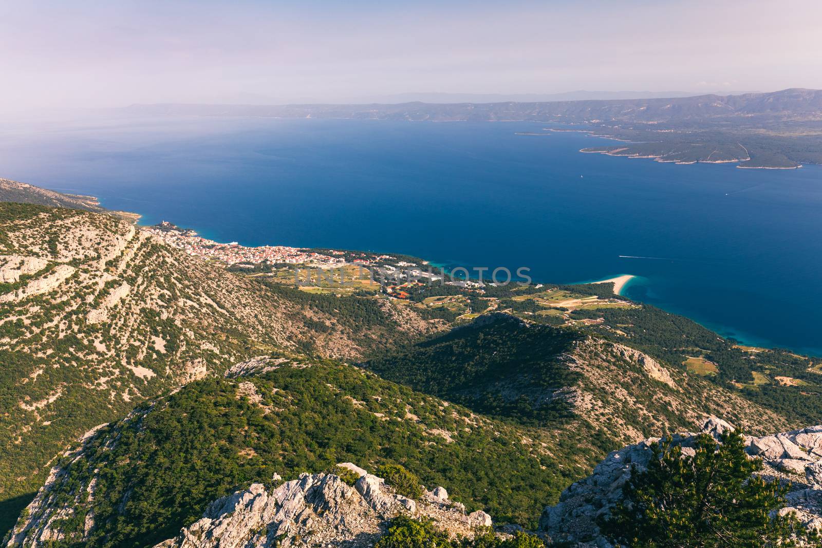 Zlatni Rat (Golden Cape or Golden Horn) famous turquoise beach in Bol town on Brac island, Dalmatia, Croatia. Zlatni Rat sandy beach at Bol on Brac island of Croatia in summertime.