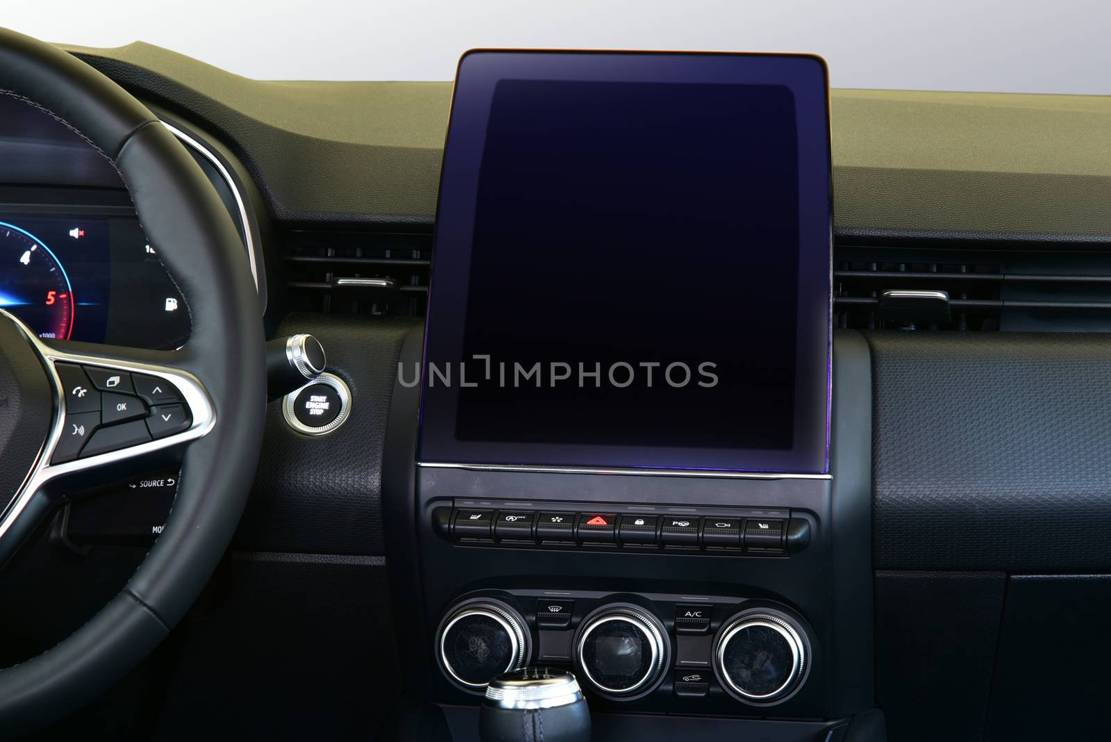 Screen multimedia system on dashboard in a modern car by aselsa