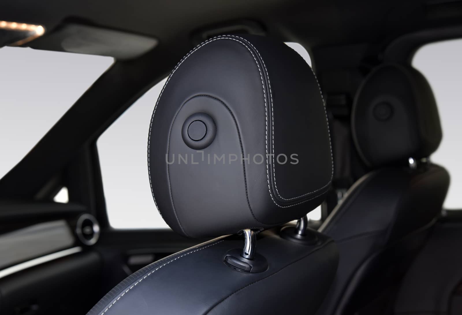 detail in the interior of the modern car, headrest detail on the passenger car