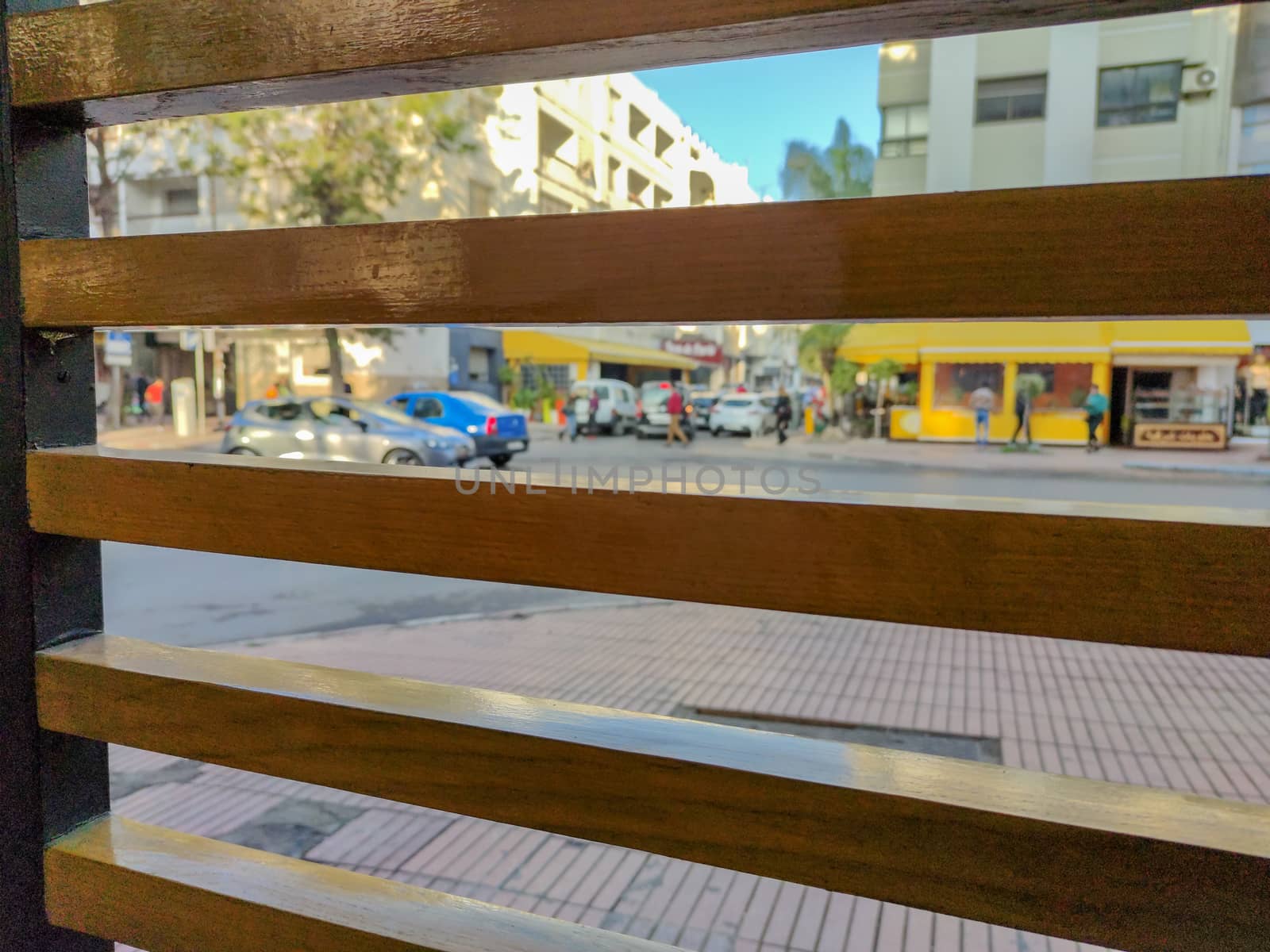 a wood window overlooking the street by devoxer