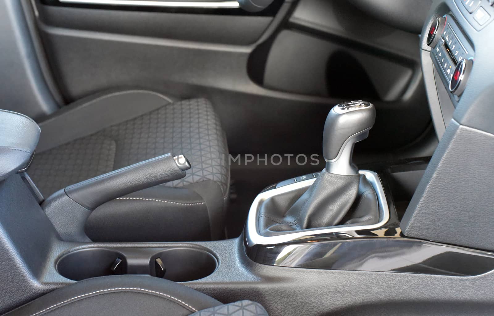 manual gear shift and handbrake inside the passenger car by aselsa