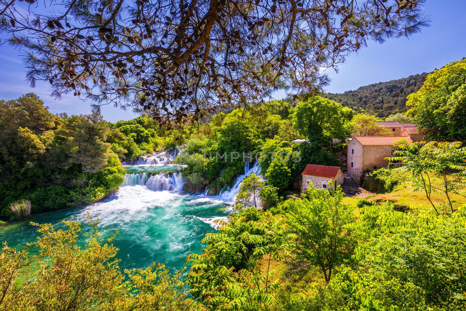Waterfalls Krka, National Park, Dalmatia, Croatia. View of Krka National Park, Roski Slap location, Croatia, Europe. Beautiful world of Mediterranean countries. Traveling concept background.