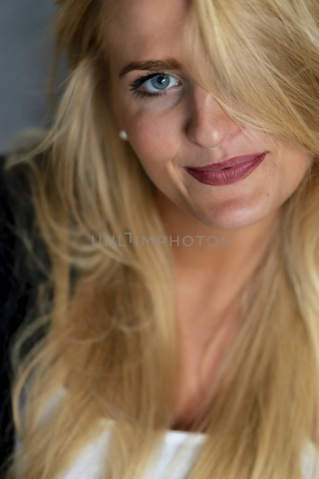 A gorgeous blonde model enjoys a day at home before work