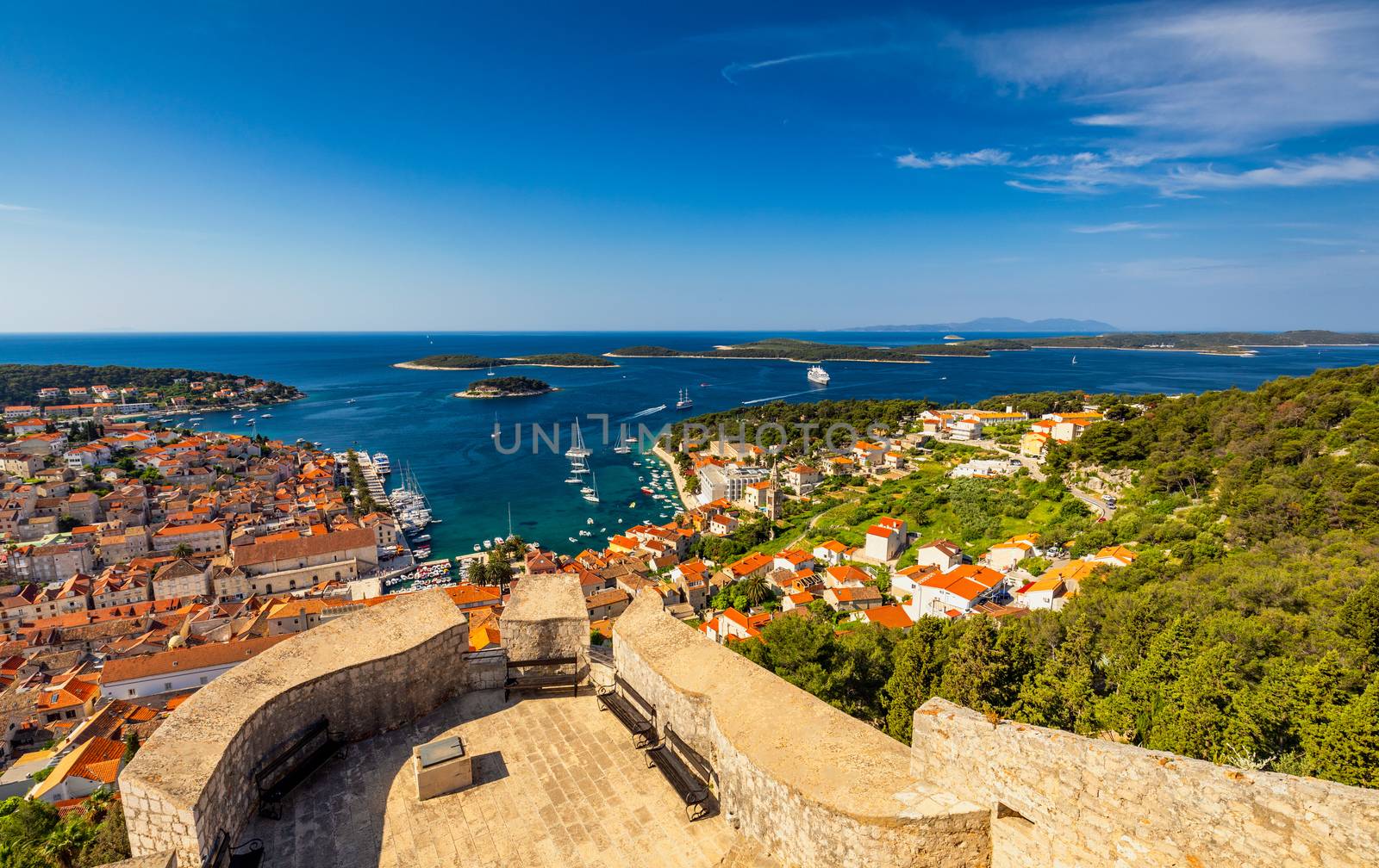 View at amazing archipelago in front of town Hvar, Croatia. Harbor of old Adriatic island town Hvar. Popular touristic destination of Croatia. Amazing Hvar city on Hvar island, Croatia.