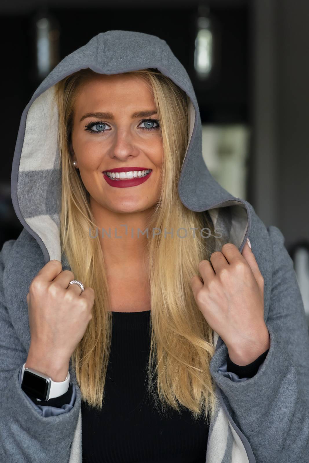 A gorgeous blonde model enjoys a day at home before work