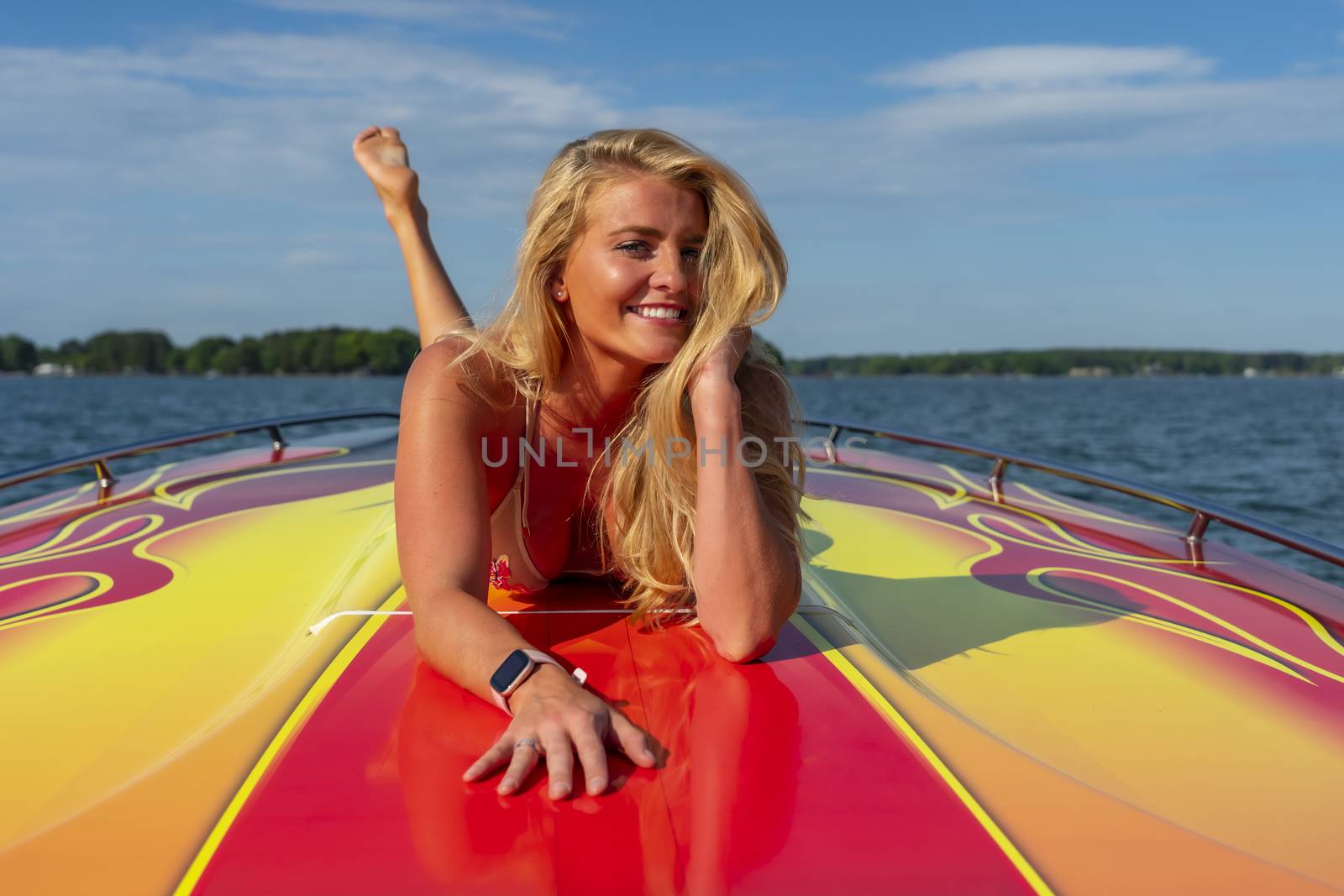 A gorgeous bikini model enjoying a day on the water