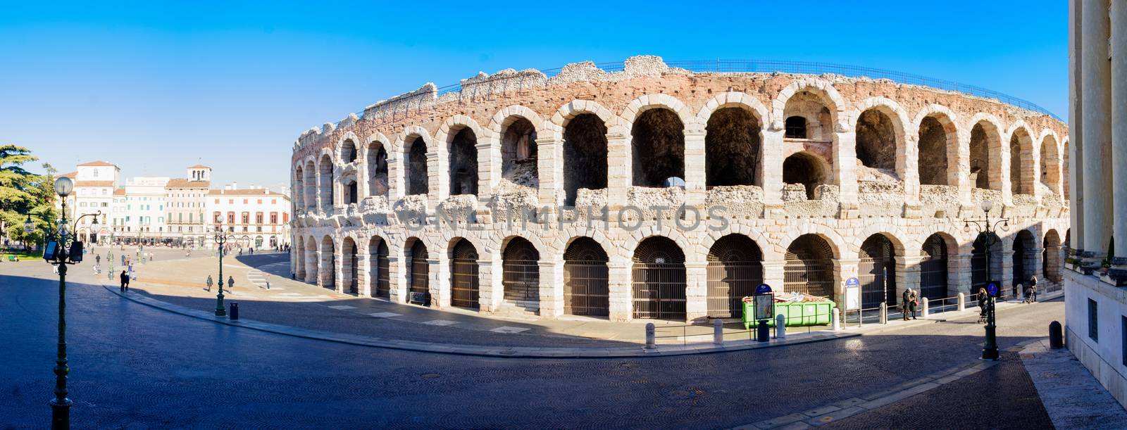 VERONA, ITALY - FEB 01, 2015: Scene of Piazza Bra and the Arena, with local and tourists, in Verona, Veneto, Italy