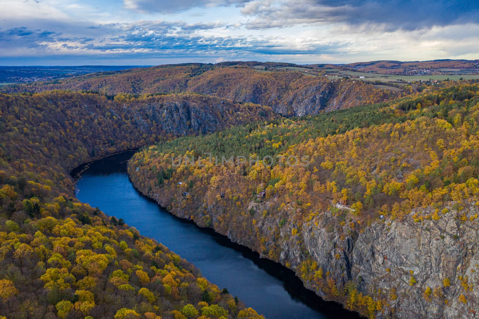 Beautiful Vyhlidka Maj, Lookout Maj, near Teletin, Czech Republic. Meander of the river Vltava surrounded by colorful autumn forest viewed from above. Tourist attraction in Czech landscape. Czechia.