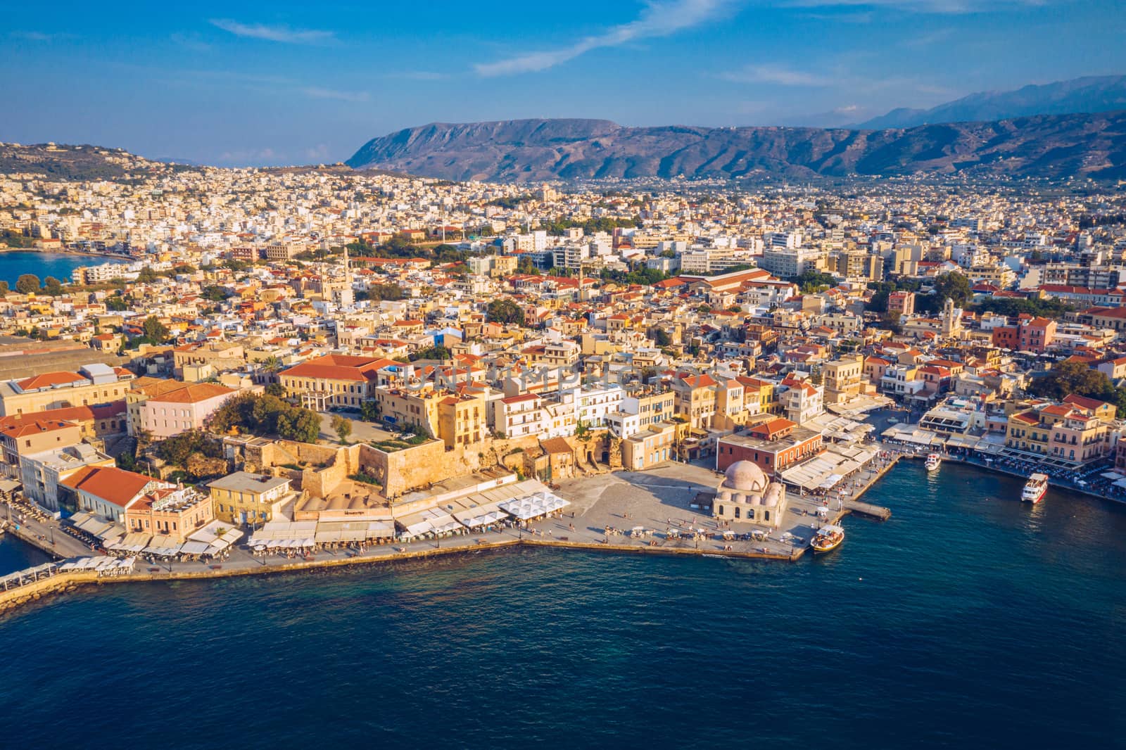 Panoramic aerial view from above of the city of Chania, Crete island, Greece. Landmarks of Greece, beautiful venetian town Chania in Crete island. Chania, Crete, Greece.