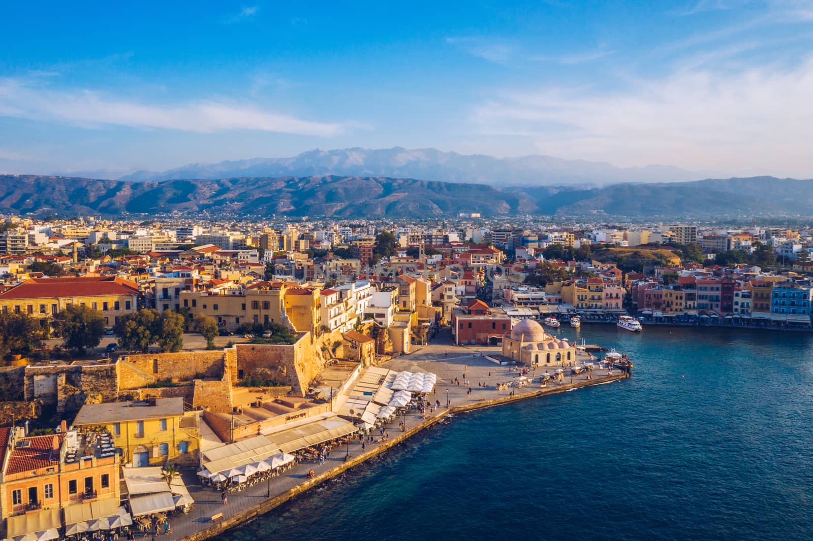 Picturesque old port of Chania. Landmarks of Crete island. Greece. Aerial view of the beautiful city of Chania with it's old harbor and the famous lighthouse, Crete, Greece.