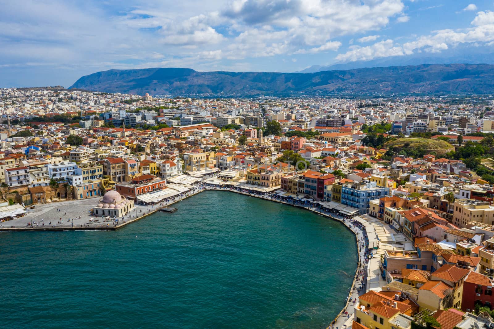 Panoramic aerial view from above of the city of Chania, Crete island, Greece. Landmarks of Greece, beautiful venetian town Chania in Crete island. Chania, Crete, Greece.