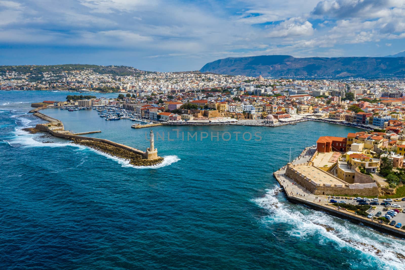 Panoramic aerial view from above of the city of Chania, Crete island, Greece. Landmarks of Greece, beautiful venetian town Chania in Crete island. Chania, Crete, Greece.