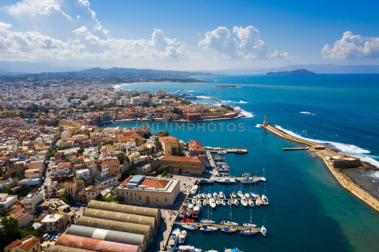 Panoramic aerial view from above of the city of Chania, Crete island, Greece. Landmarks of Greece, beautiful venetian town Chania in Crete island. Chania, Crete, Greece.