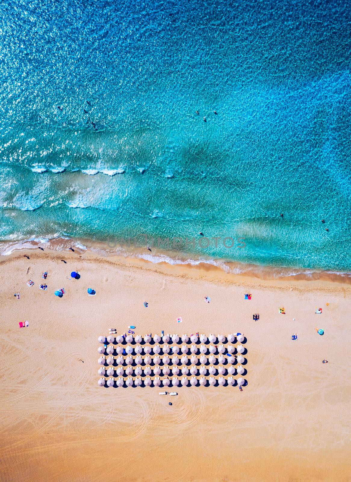 Aerial shot of beautiful turquoise beach Falasarna (Falassarna) in Crete, Greece. View of famous paradise sandy deep turquoise beach of Falasarna (Falassarna) in North West, Crete island, Greece.