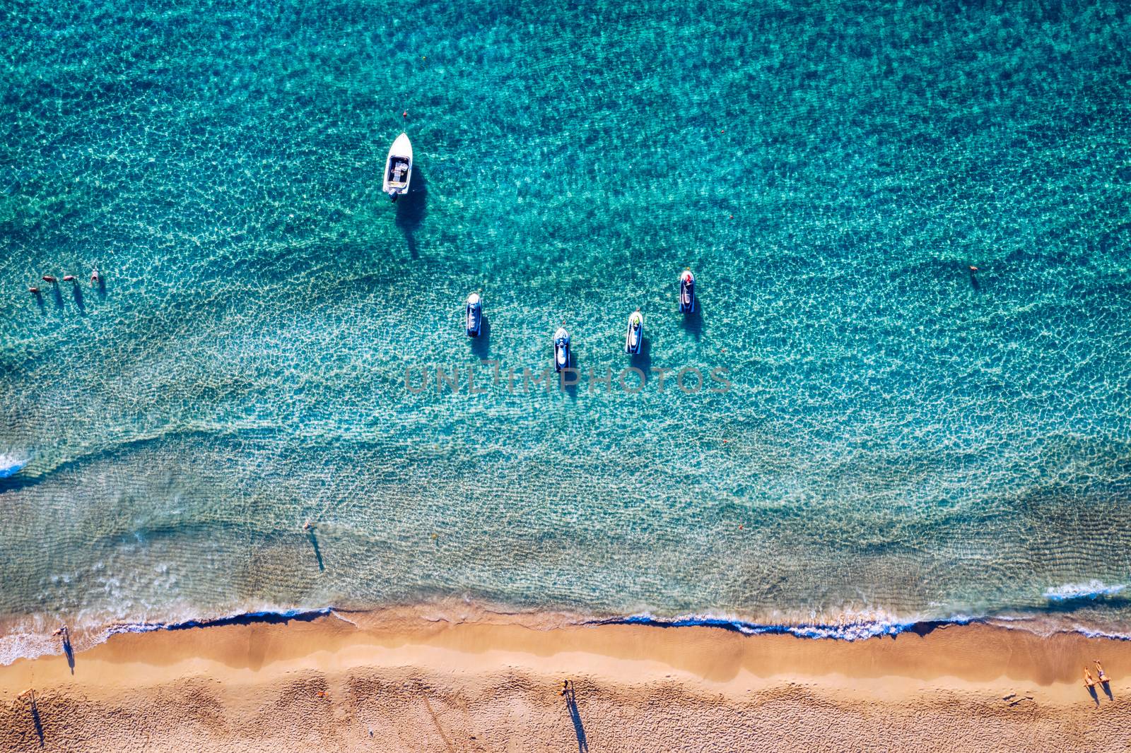 Aerial shot of beautiful turquoise beach Falasarna (Falassarna) in Crete, Greece. View of famous paradise sandy deep turquoise beach of Falasarna (Falassarna) in North West, Crete island, Greece.