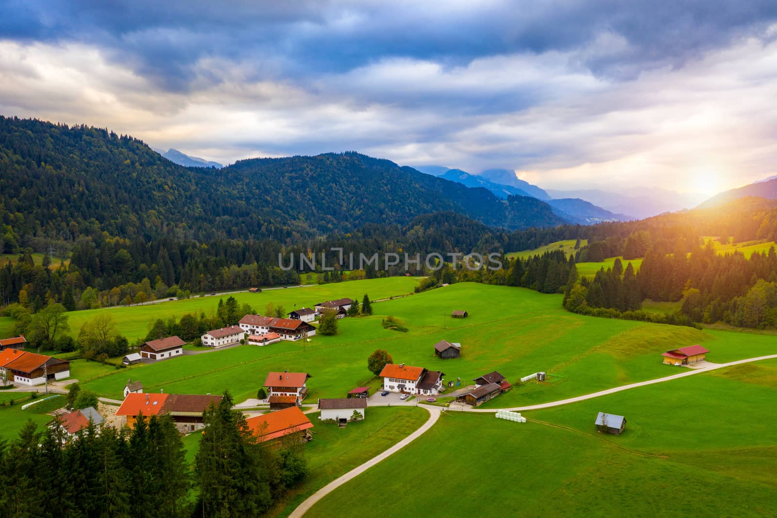 View from flying drone. Astonishing evening view of Wagenbruchsee (Geroldsee) lake with Westliche Karwendelspitze mountain range on background, Bavarian Alps, Germany, Europe.