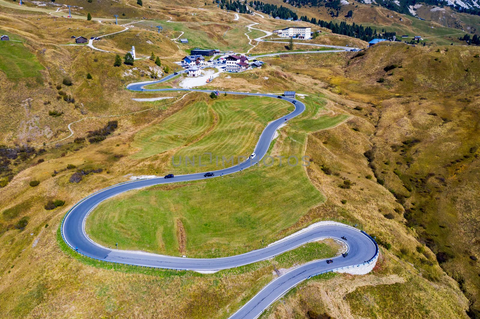 Gardena Pass, Trentino Alto Adige, Italy. Gardena Pass with Sassolungo mountain on the background. Passo Gardena, alpine pass between Val Badia and Val Gardena, South Tyrol, Italy.