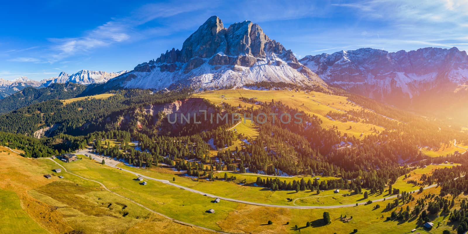 Stunning view of Peitlerkofel mountain from Passo delle Erbe in Dolomites, Italy. View of Sass de Putia (Peitlerkofel) at Passo delle Erbe, with wooden farm houses, Dolomites, South Tyrol, Italy.