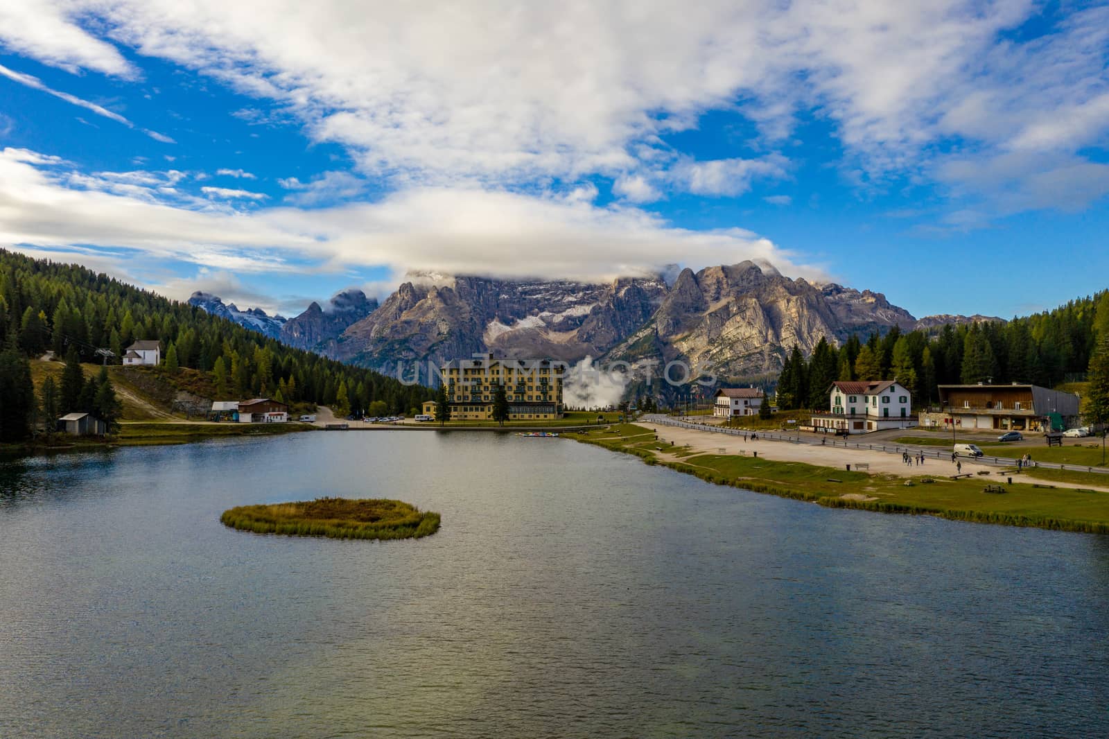 Lake Misurina or Lago di Misurina Italy. Misurina Lake with perfect sky reflection in calm water. Stunning view on the majestic Dolomites Alp Mountains, Italy, National Park Tre Cime di Lavaredo.