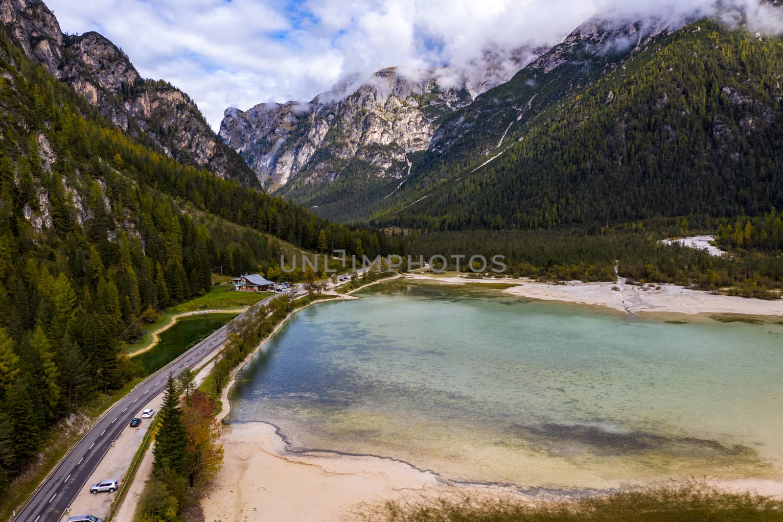 Lago di Landro, lake in the Dolomites in South Tyrol, Italy. Autumn peaceful alpine lake Durrensee or Lago di Landro. Mountains above the lake Lago di Landro. In the fall, Dolomites, Italy.