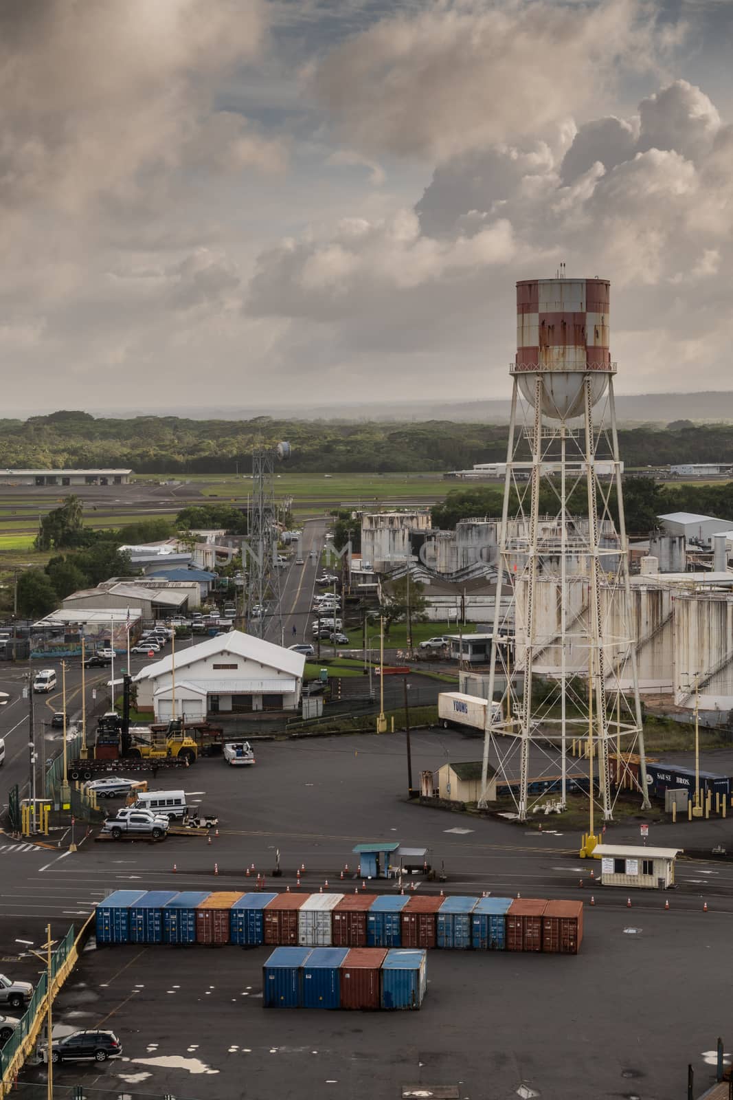 Ocean Port access road with water tower in Hilo, Hawaii, USA. by Claudine