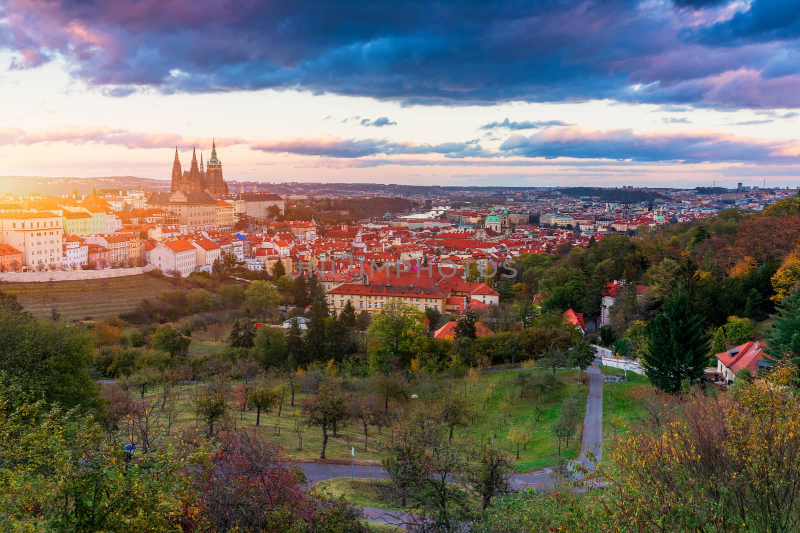Prague autumn landscape. Prague autumn landscape view to Saint Vitus cathedral. Prague. Prague panorama. Prague, Czech Republic. Scenic autumn aerial view of the Old Town with red foliage. Czechia.