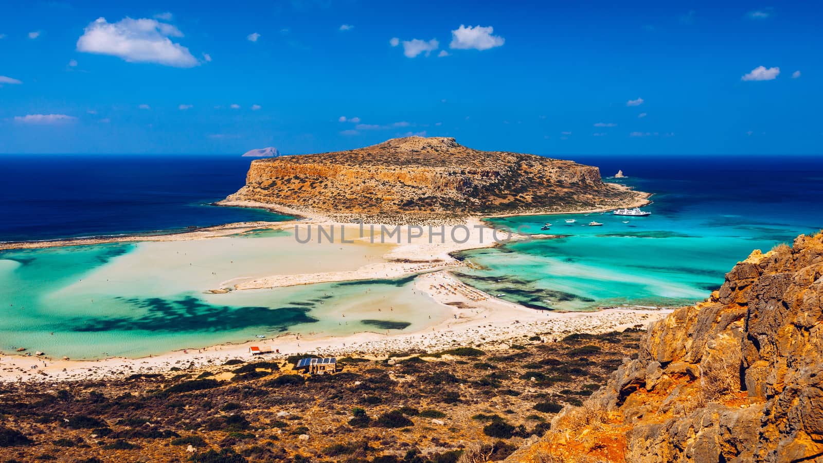 Amazing beach with turquoise water at Balos Lagoon and Gramvousa in Crete, Greece. Cap tigani in the center. Balos beach on Crete island, Greece. Landscape of Balos beach at Crete island in Greece.