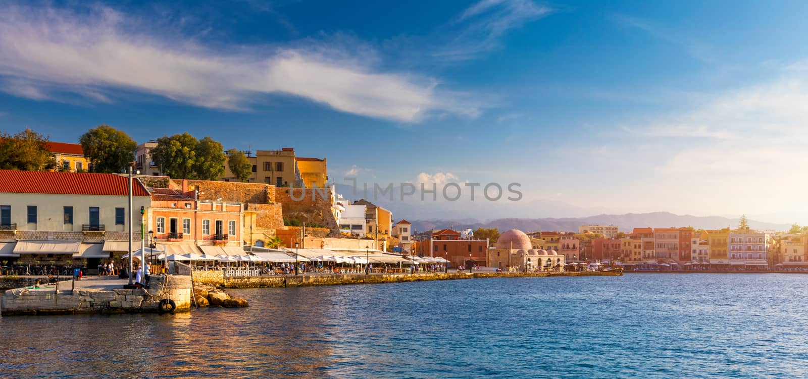 Picturesque old port of Chania. Landmarks of Crete island. Greece. Bay of Chania at sunny summer day, Crete Greece. View of the old port of Chania, Crete, Greece. The port of chania, or Hania. 