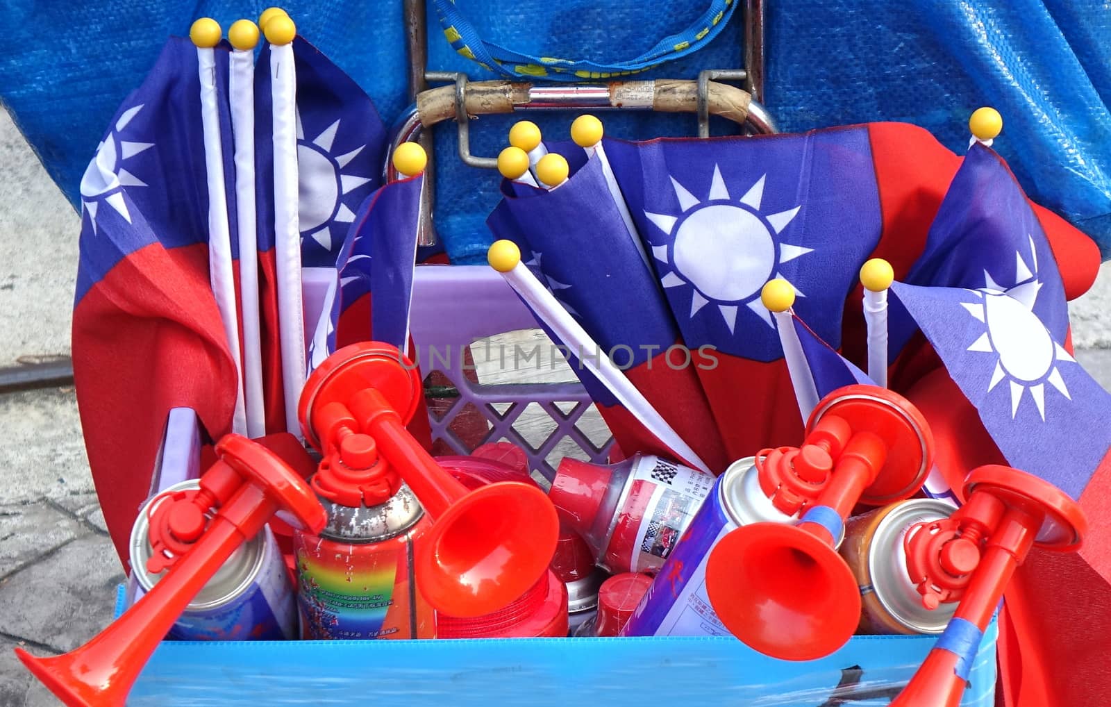 KAOHSIUNG, TAIWAN -- NOVEMBER 10, 2018: A vendor sells air horns and national flags at an election rally.
