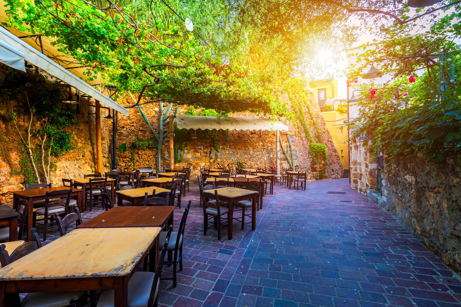 Street in the old town of Chania, Crete, Greece. Charming streets of Greek islands, Crete. Beautiful street in Chania, Crete island, Greece. Summer landscape. Chania old street of Crete island Greece.