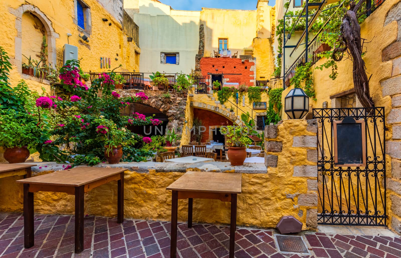 Street in the old town of Chania, Crete, Greece. Charming streets of Greek islands, Crete. Beautiful street in Chania, Crete island, Greece. Summer landscape. Chania old street of Crete island Greece.