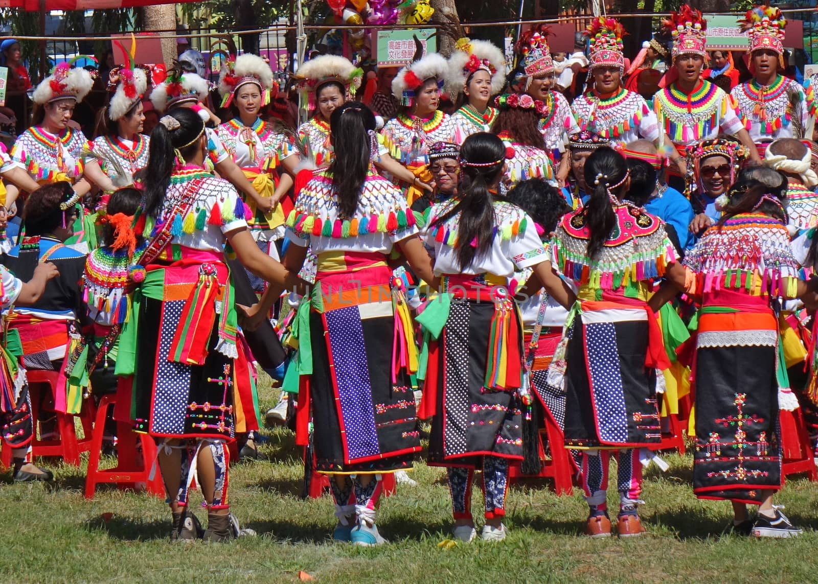 KAOHSIUNG, TAIWAN -- SEPTEMBER 29, 2018: Members of the indigenous Amis tribe in traditional costumes participate in the yearly harvest festival.