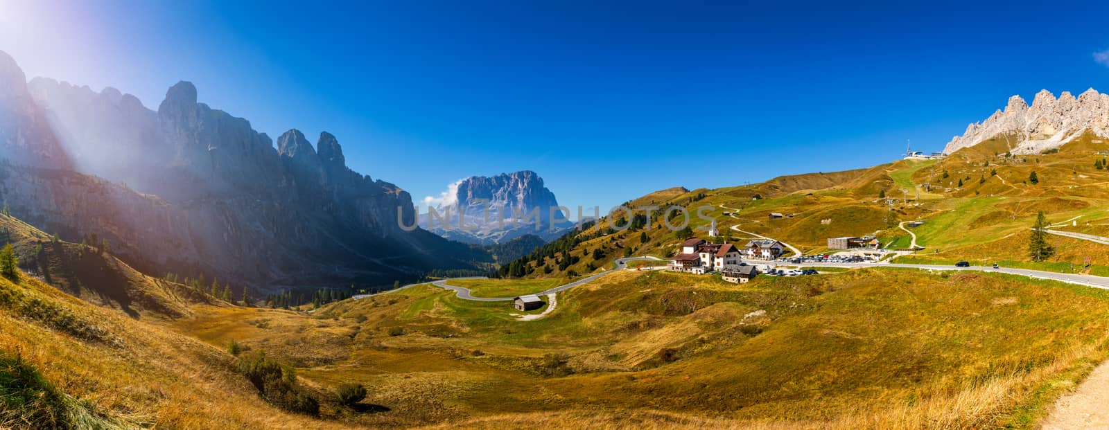 Gardena Pass, Trentino Alto Adige, Italy. Gardena Pass with Sassolungo mountain on the background. Passo Gardena, alpine pass between Val Badia and Val Gardena, South Tyrol, Italy.