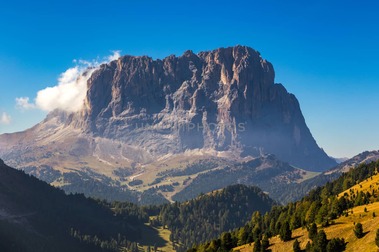 Gardena Pass, Trentino Alto Adige, Italy. Gardena Pass with Sassolungo mountain on the background. Passo Gardena, alpine pass between Val Badia and Val Gardena, South Tyrol, Italy.