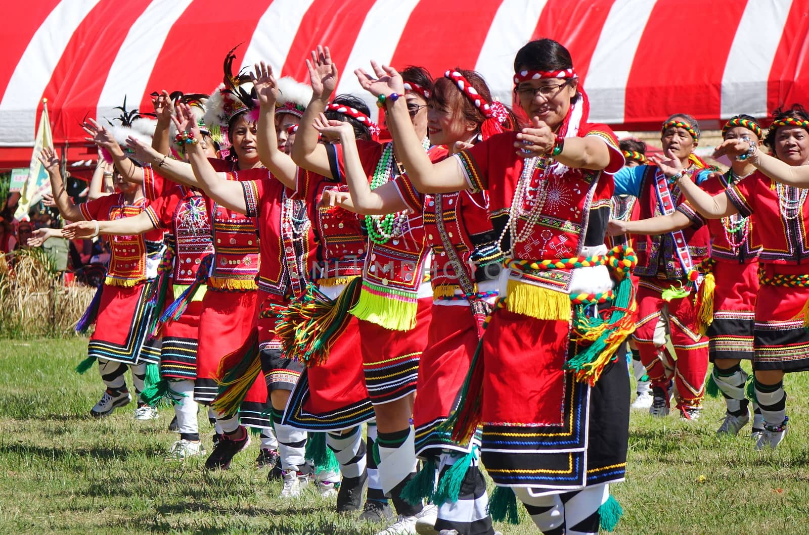 KAOHSIUNG, TAIWAN -- SEPTEMBER 29, 2018: Members of the indigenous Amis tribe in traditional costumes participate in the yearly harvest festival.