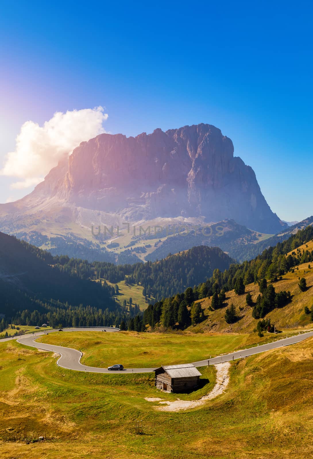 Gardena Pass, Trentino Alto Adige, Italy. Gardena Pass with Sassolungo mountain on the background. Passo Gardena, alpine pass between Val Badia and Val Gardena, South Tyrol, Italy.
