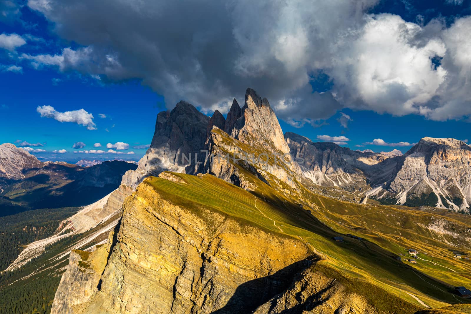 View on Seceda peak. Trentino Alto Adige, Dolomites Alps, South Tyrol, Italy. Odle mountain range, Val Gardena. Majestic Furchetta peak. Odles group seen from Seceda, Santa Cristina Val Gardena.