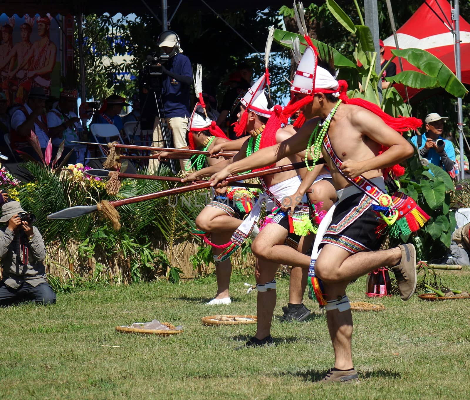 KAOHSIUNG, TAIWAN -- SEPTEMBER 29, 2018: Members of the indigenous Amis tribe in traditional costumes participate in the yearly harvest festival.